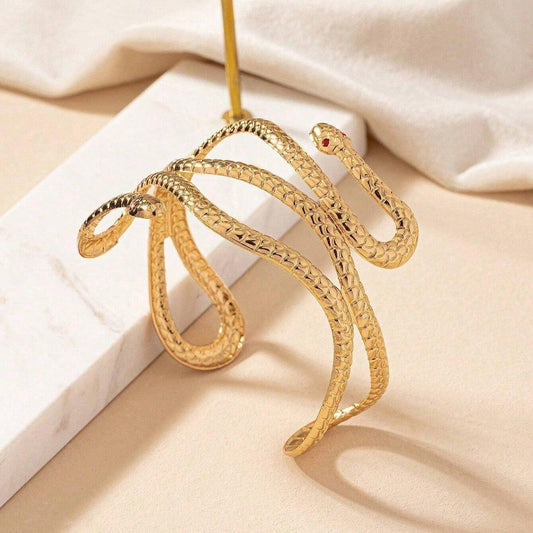 Bratara aurie, reglabila, forma de sarpe, cu pietre rosii, Penille C9 - Pursehuit.ro