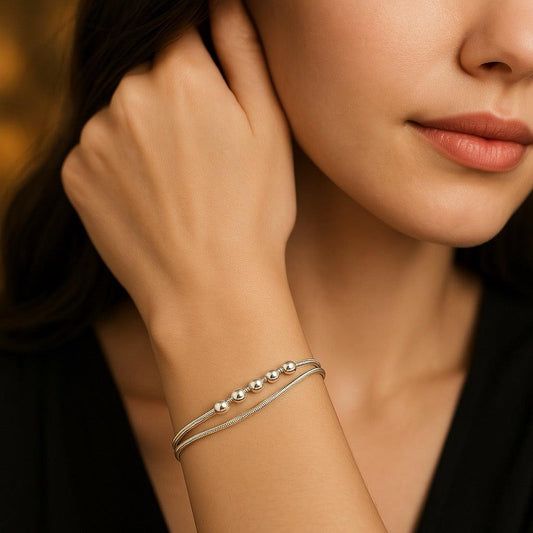 Bratara argintie, din otel inoxidabil, suflata cu aur 18k, cu bilute, Elita C3 - Pursehuit.ro