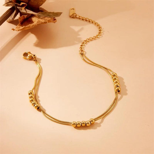 Bratara aurie, din otel inoxidabil, suflata cu aur 18k, cu bilute, Elke C3 - Pursehuit.ro