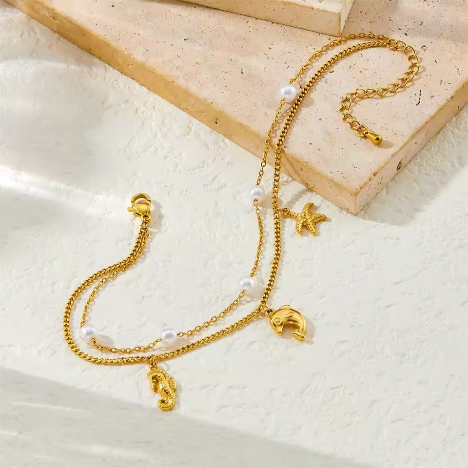 Bratara de picior, aurie, din otel inoxidabil, suflata cu aur 18k, cu motive marine si perlute, Adama C4