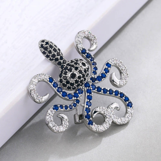 Brosa argintie, forma de caracatita, cu pietre albastre, Reny C2 - Pursehuit.ro