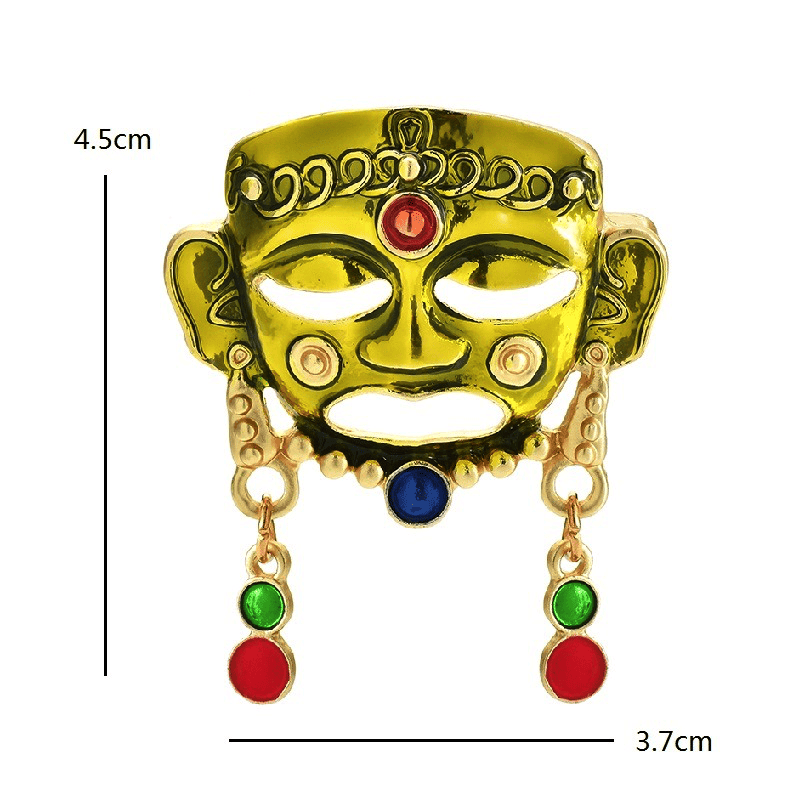 Brosa aurie, forma de masca tribala, Isidora C2 - Pursehuit.ro