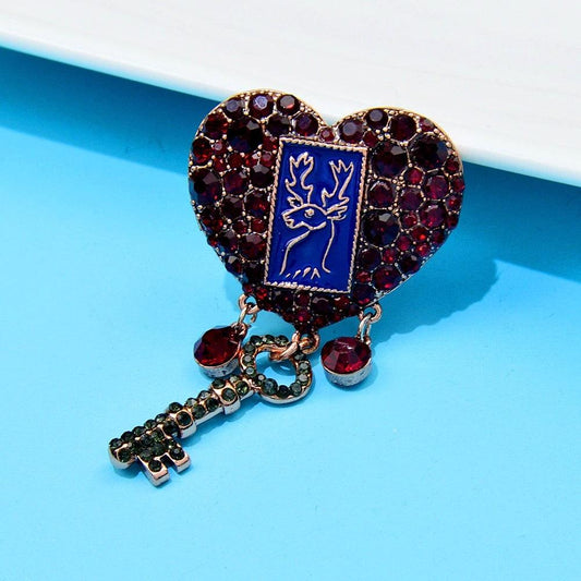 Brosa aurie, in forma de inima, cu pietre rosii, Larina C2 - Pursehuit.ro