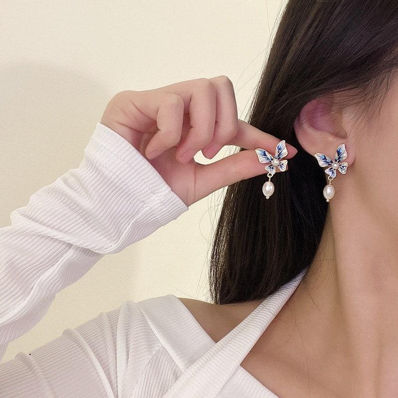 Cercei aurii, cu clips, forma de fluture, cu perle, Ioulia C5 - Pursehuit.ro