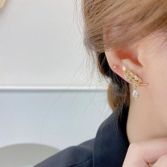 Cercei aurii, suflati cu aur 14 k, forma de frunza, cu pietre din zirconiu, Letha C4 - Pursehuit.ro