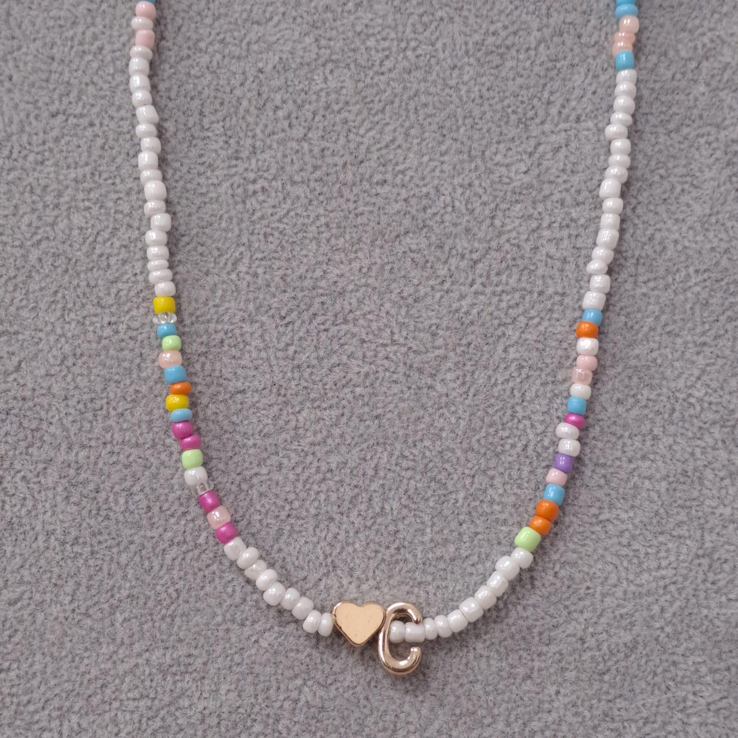 Colier auriu, cu margelute colorate, litera C C2 - Pursehuit.ro