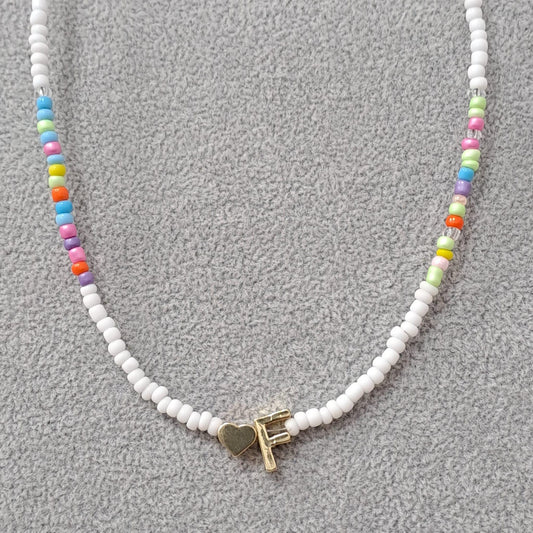 Colier auriu, cu margelute colorate, litera F C2 - Pursehuit.ro