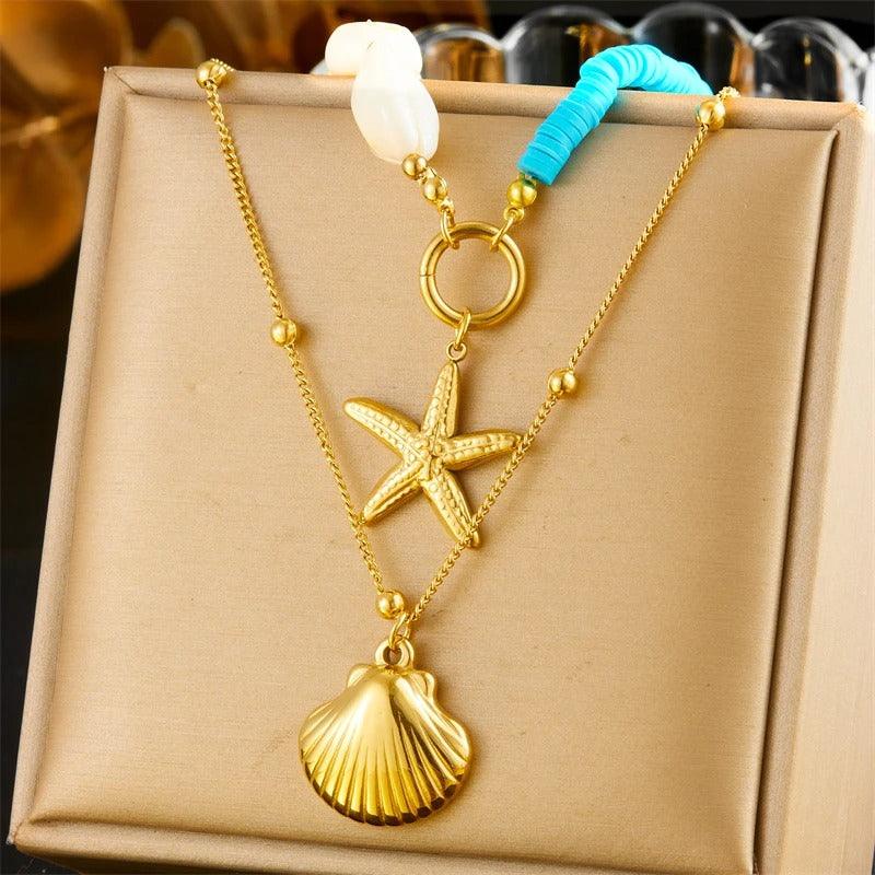 Colier auriu, din otel inoxidabil, suflat cu aur 18k, in 2 straturi, cu scoici si stea de mare, Ebrikka C1 - Pursehuit.ro