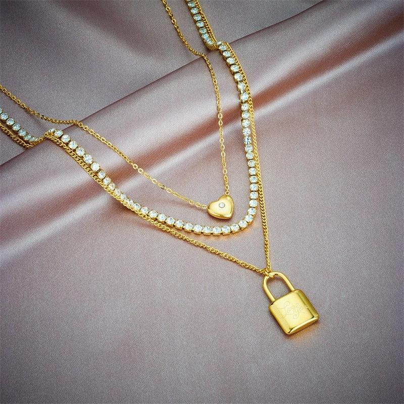 Colier auriu, din otel inoxidabil, suflat cu aur 18k, tennis, in 3 straturi, cu pietre si lacat, Dyveke C1 - Pursehuit.ro