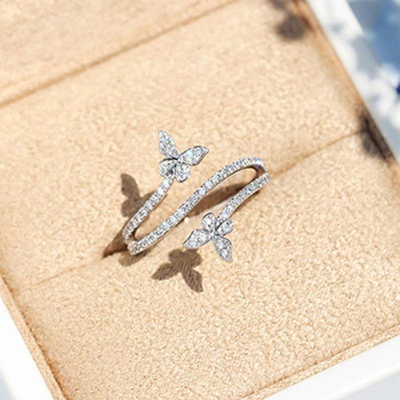 Inel argintiu, cu pietre din zirconiu si fluturasi, Penny C9 - Pursehuit.ro