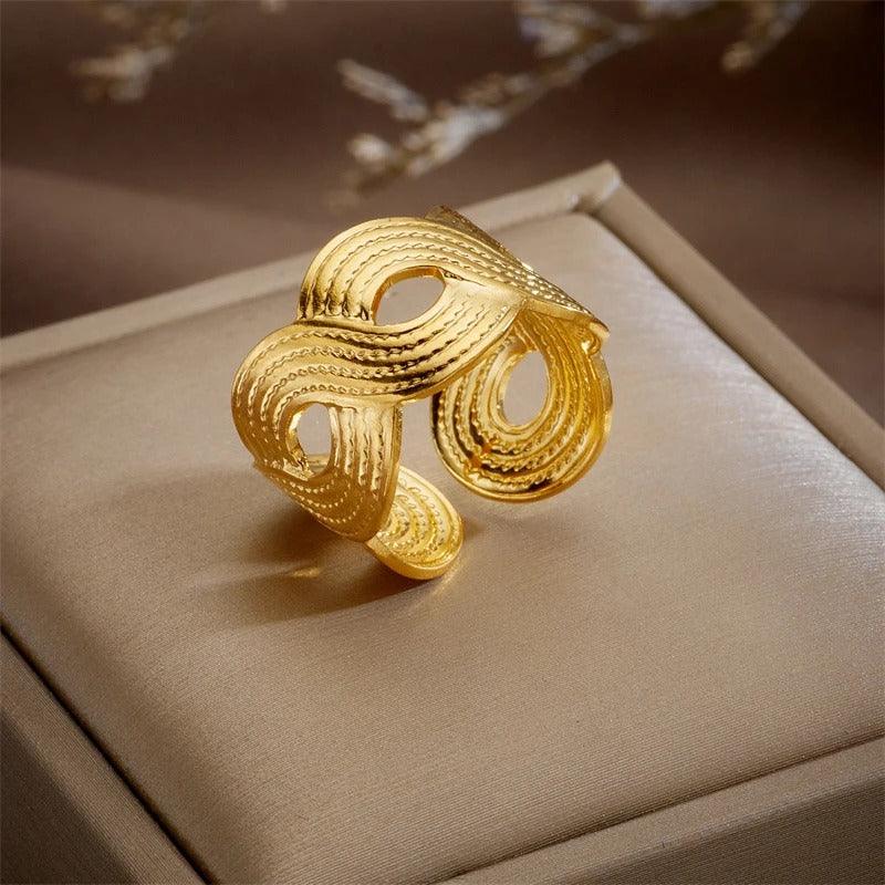 Inel auriu, reglabil, din otel inoxidabil, suflat cu aur 18k, forma impletita, Cira C4 - Pursehuit.ro