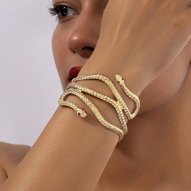 Bratara aurie, reglabila, forma de sarpe, cu pietre rosii, Penille C9 - Pursehuit.ro