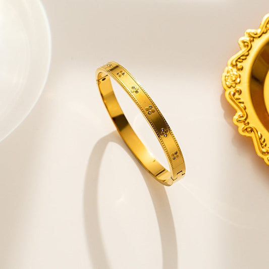 Bratara aurie, din otel inoxidabil, suflata cu aur 18k, tip bangle, cu pietricele, Isalin C5