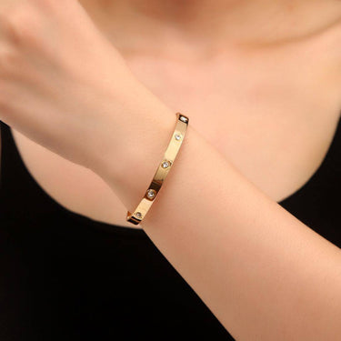 Bratara aurie, tip bangle, din otel inoxidabil, suflata cu aur 18k, cu zirconii, Calyssa C1