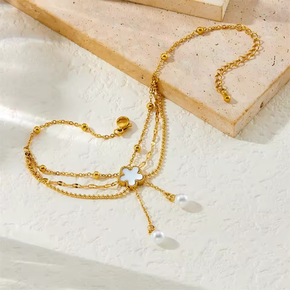 Bratara de picior, aurie, din otel inoxidabil, suflata cu aur 18k, cu floricica si perlute, Abelina C4