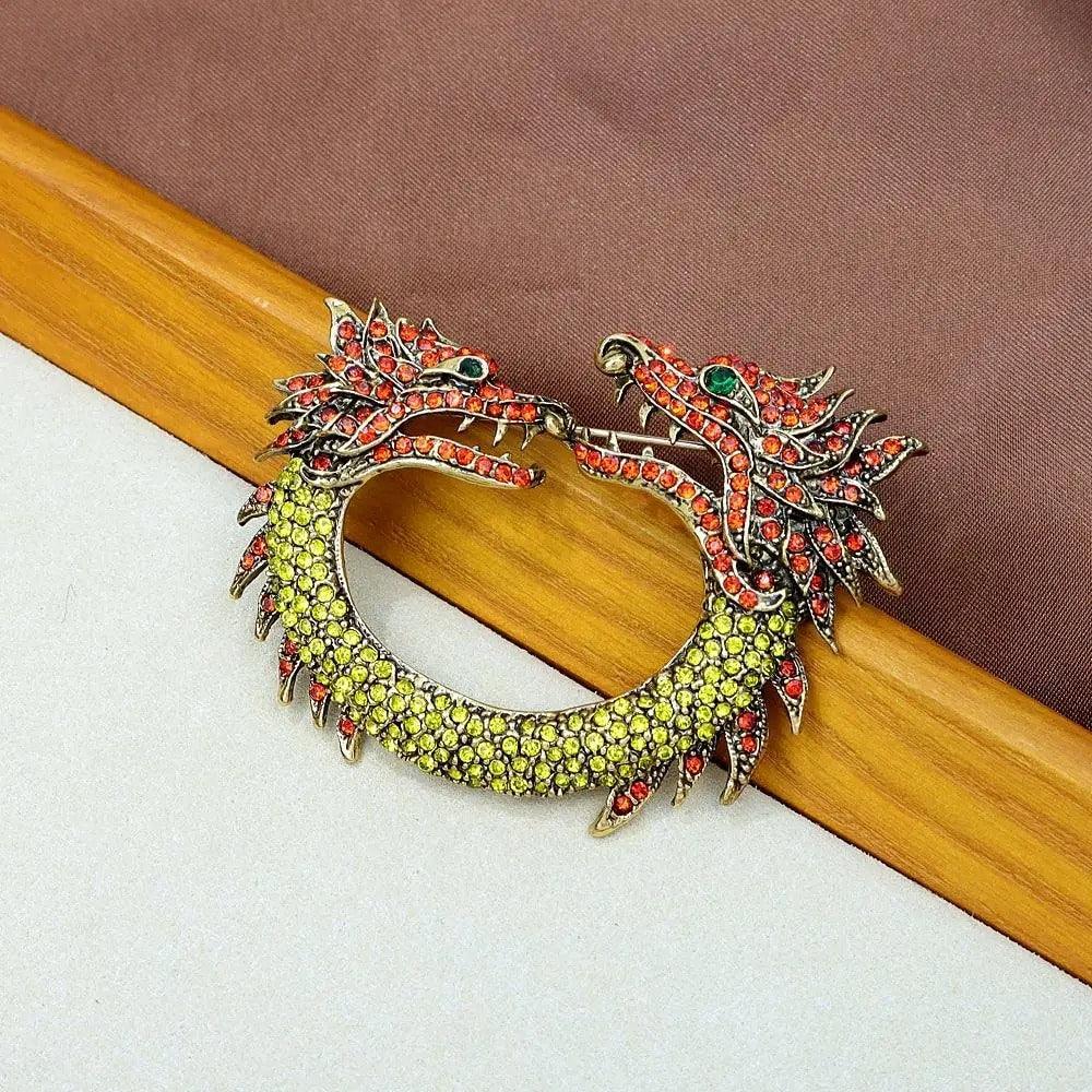 Brosa aurie, forma de dragon, cu pietre, Marvel C1 - Pursehuit.ro