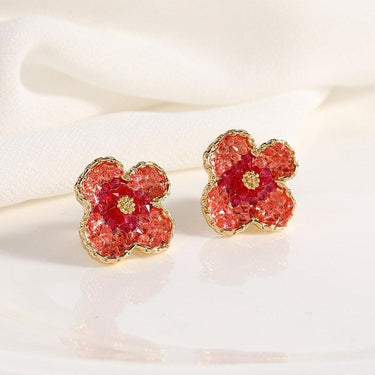 Cercei aurii, cu clips, forma de floare, cu cristale rosii, Eleen C3 - Pursehuit.ro