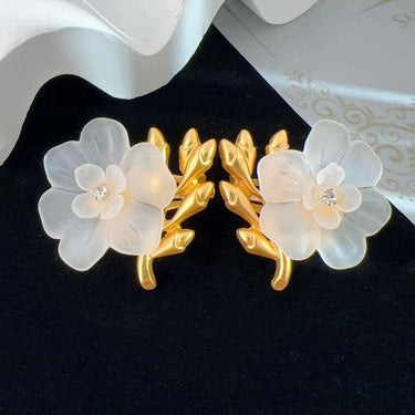 Cercei aurii, cu clips, forma de floare, cu pietre si crengute, Elara C3 - Pursehuit.ro
