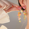Cercei aurii, cu clips si cristale multicolore, Eleanor C4 - Pursehuit.ro