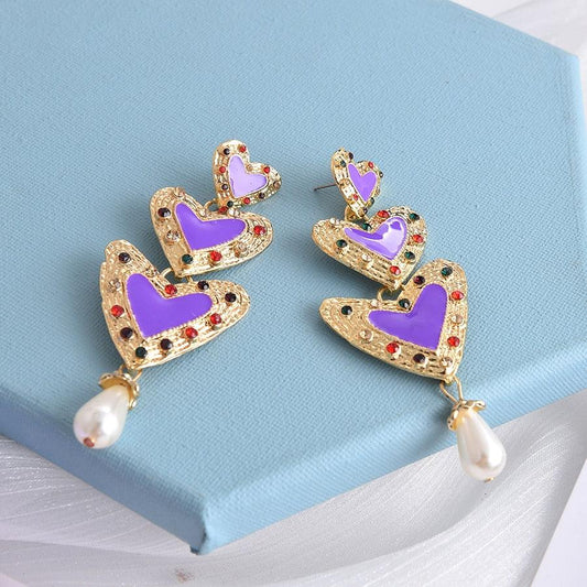 Cercei aurii, cu inimi mov si pietre, Sindri C2 - Pursehuit.ro