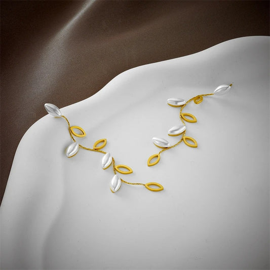 Cercei aurii, lungi, din otel inoxidabil, forma de frunzulite, suflati cu aur 18k, Denys C5