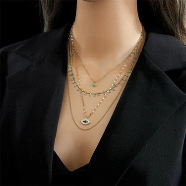 Colier auriu, in 4 straturi, din otel inoxidabil, cu margelute turquoise si pietre, suflat cu aur 18k, Ragni C5 - Pursehuit.ro