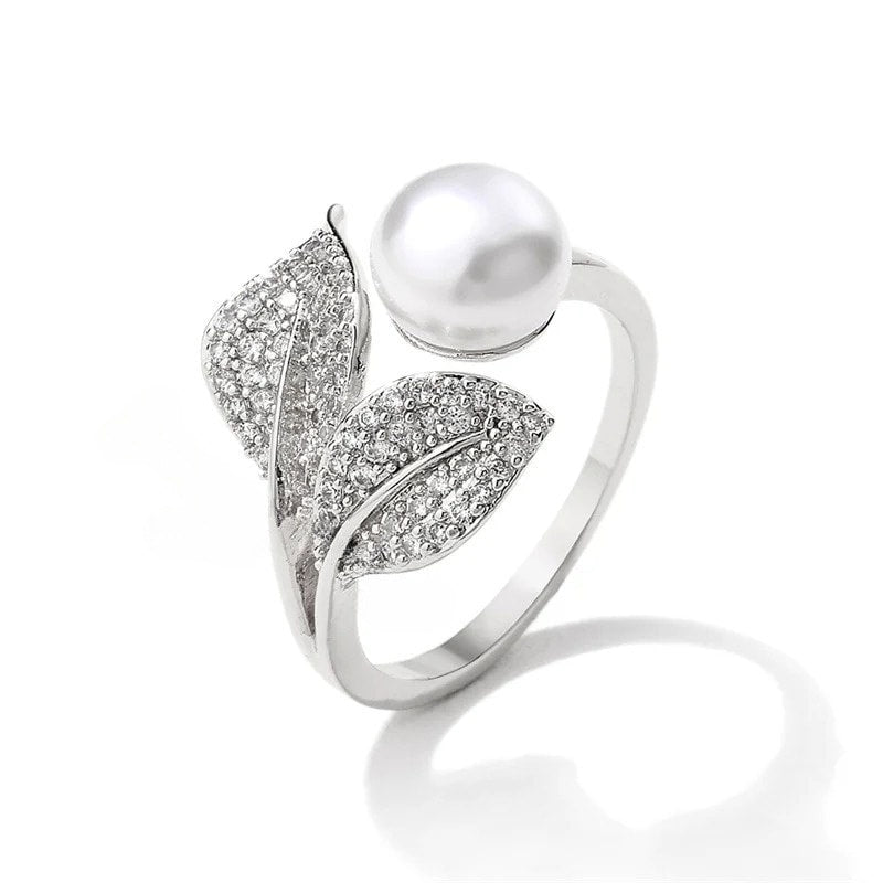 Inel argintiu, reglabil, forma de frunza, cu perla si pietre din zirconiu, Nanci C6