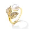 Inel auriu, reglabil, forma de frunza, cu perla si pietre din zirconiu, Nadina C6
