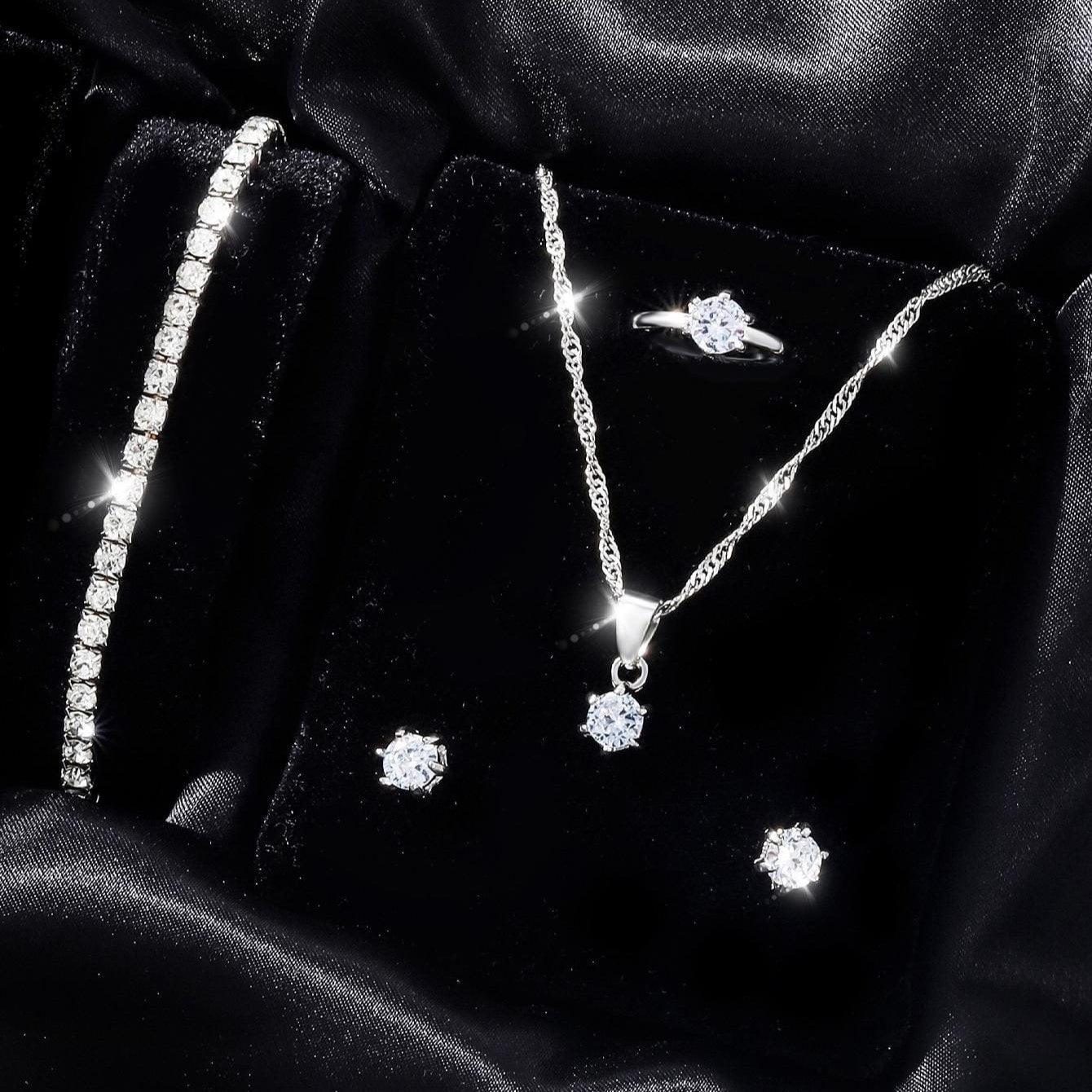 Set colier, cercei, inel si bratara tennis, argintiu, cu pietre, Nichlaes C8 - Pursehuit.ro